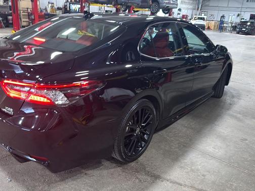 Midnight Black Metallic 2024 Toyota Camry Hybrid SE