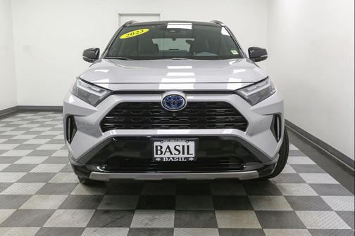 Silver Sky Metallic w/Midnight Black Metallic Roof 2023 Toyota RAV4 Hybrid SE