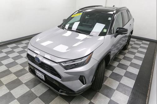 Silver Sky Metallic w/Midnight Black Metallic Roof 2023 Toyota RAV4 Hybrid SE