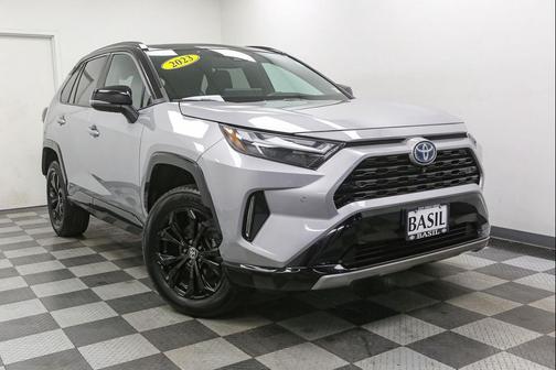 Silver Sky Metallic w/Midnight Black Metallic Roof 2023 Toyota RAV4 Hybrid SE