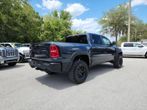 Forged Blue Metallic 2026 RAM 1500 RHO Crew Cab 4x4 5'7' Box