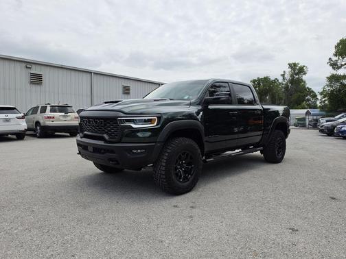 Serrano Green Metallic 2026 RAM 1500 RHO Crew Cab 4x4 5'7' Box