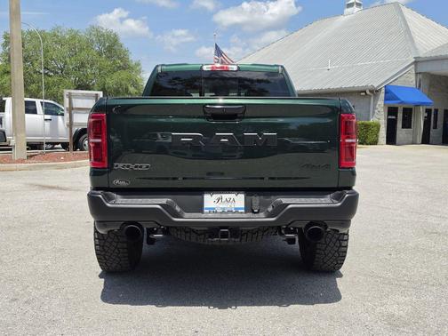Serrano Green Metallic 2026 RAM 1500 RHO Crew Cab 4x4 5'7' Box