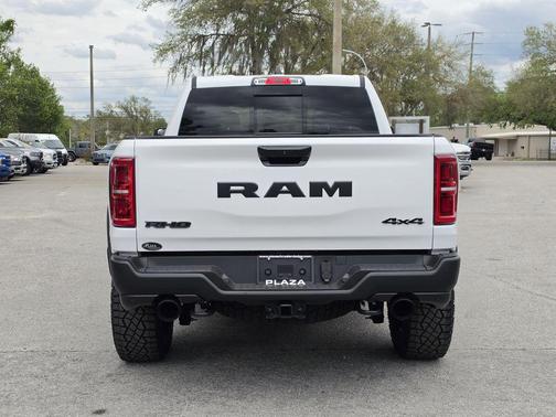Bright White Clearcoat 2026 RAM 1500 RHO Crew Cab 4x4 5'7' Box