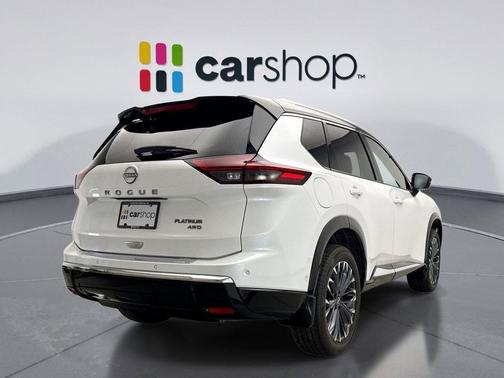 Everest White Pearl/Super Black 2025 Nissan Rogue Platinum