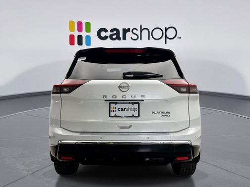 Everest White Pearl/Super Black 2025 Nissan Rogue Platinum
