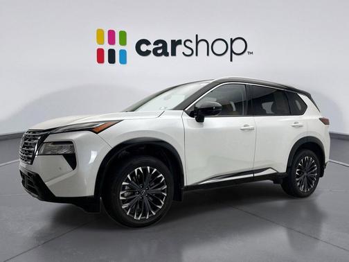 Everest White Pearl/Super Black 2025 Nissan Rogue Platinum
