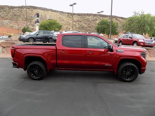Volcanic Red Tintcoat 2023 GMC Sierra 1500 AT4
