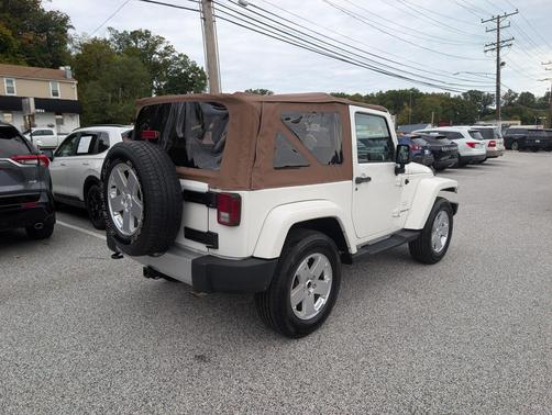 Stone White 2010 Jeep Wrangler Sahara