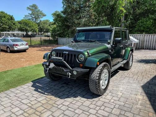 Natural Green Pearlcoat 2011 Jeep Wrangler Unlimited Sahara