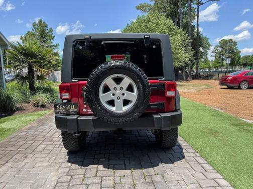 Deep Cherry Red Crystal 2012 Jeep Wrangler Sport