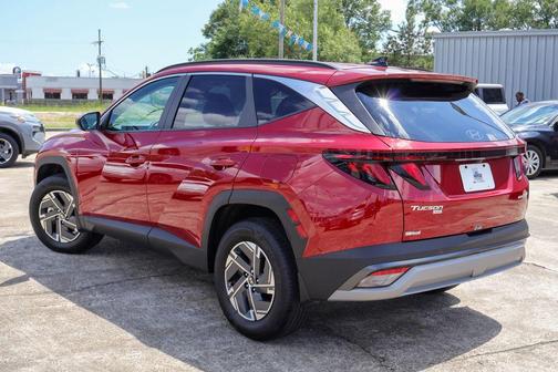 Red 2025 Hyundai TUCSON Hybrid Blue