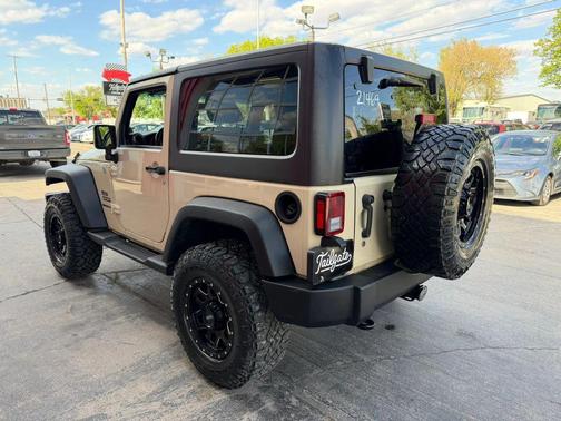 Tan 2011 Jeep Wrangler Sport