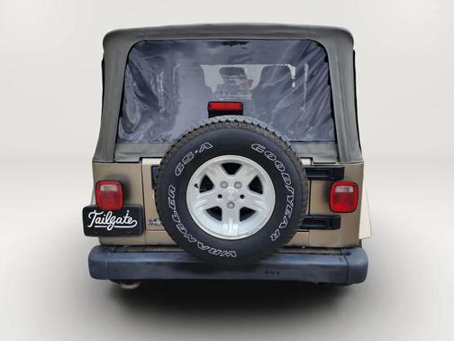 Tan 2004 Jeep Wrangler Sport