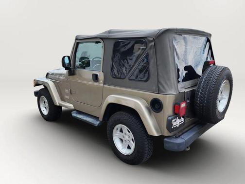 Tan 2004 Jeep Wrangler Sport