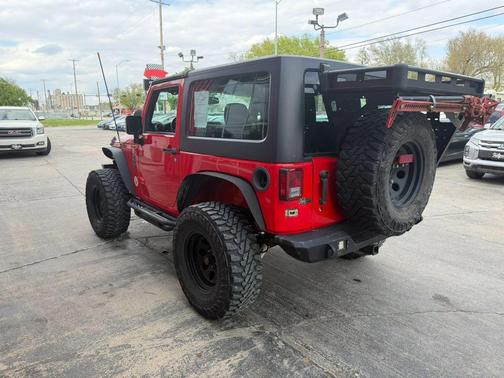Red 2015 Jeep Wrangler Sport