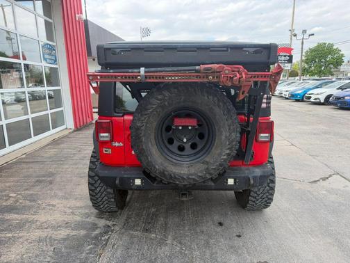 Red 2015 Jeep Wrangler Sport