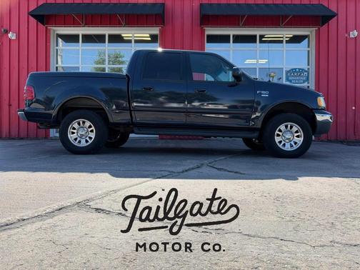 Blue 2001 Ford F-150 Lariat