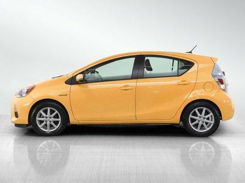 Yellow 2014 Toyota Prius c Three