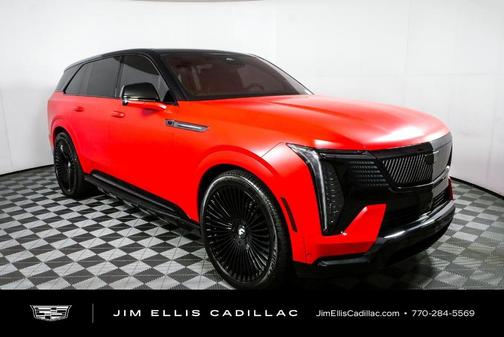 Orange 2026 Cadillac Escalade IQ Premium Sport