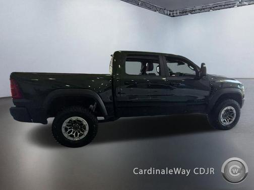 Serrano Green Metallic 2026 RAM 1500 RHO Crew Cab 4x4 5'7' Box