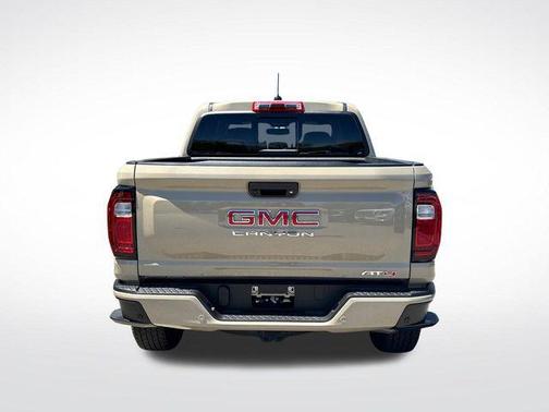 Desert Sand Metallic 2023 GMC Canyon AT4