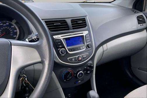 Ironman Silver Metallic 2014 Hyundai Accent GLS