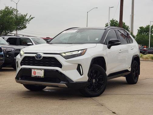 Wind Chill Pearl/Midnight Black Metallic 2024 Toyota RAV4 Hybrid SE