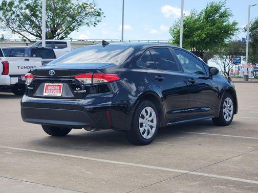 Midnight Black Metallic 2024 Toyota Corolla Hybrid LE