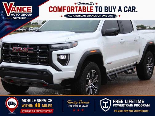 Summit White 2025 GMC Canyon AT4