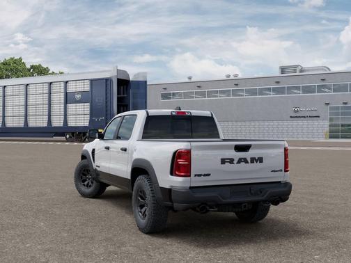 Bright White Clearcoat 2026 RAM 1500 RHO Crew Cab 4x4 5'7' Box