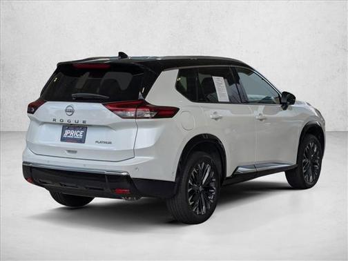 Everest White Pearl/Super Black 2025 Nissan Rogue Platinum