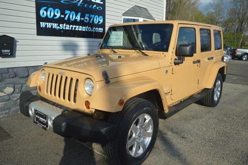 Tan 2013 Jeep Wrangler Unlimited Sahara