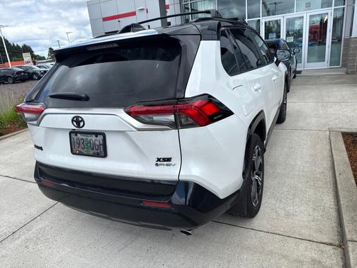 Wind Chill Pearl/Midnight Black Metallic 2025 Toyota RAV4 Plug-In Hybrid XSE