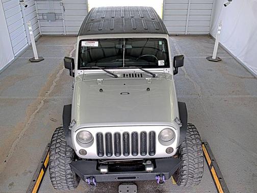 Bright Silver Metallic Clearcoat 2012 Jeep Wrangler Unlimited Sport
