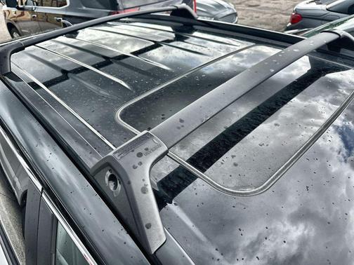 Wind Chill Pearl/Midnight Black Metallic 2025 Toyota RAV4 Hybrid SE
