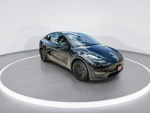 Solid Black 2025 Tesla Model Y Long Range Dual Motor All-Wheel Drive