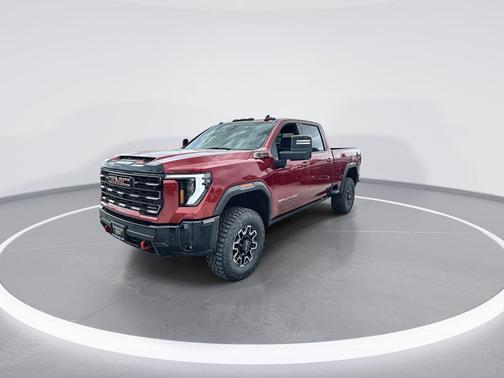 Volcanic Red Tintcoat 2026 GMC Sierra 2500 AT4X