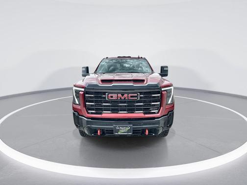 Volcanic Red Tintcoat 2026 GMC Sierra 2500 AT4X