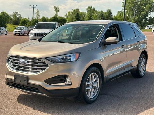 Desert Gold Metallic 2021 Ford Edge SEL