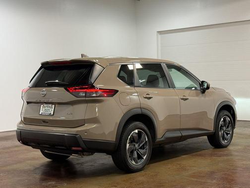 Baja Storm Metallic 2025 Nissan Rogue SV