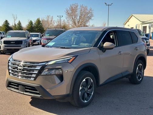 Baja Storm Metallic 2025 Nissan Rogue SV