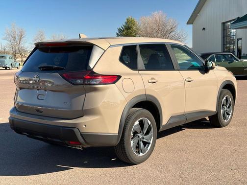 Baja Storm Metallic 2025 Nissan Rogue SV