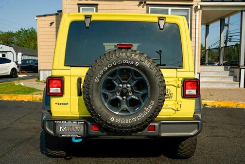 Yellow 2023 Jeep Wrangler 4xe Willys