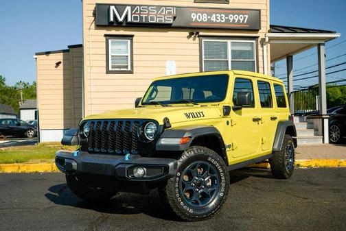 Yellow 2023 Jeep Wrangler 4xe Willys