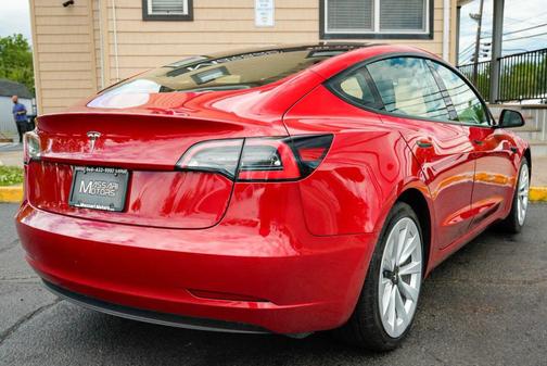 Red 2023 Tesla Model 3 Standard Range