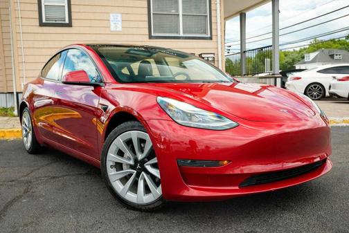Red 2023 Tesla Model 3 Standard Range