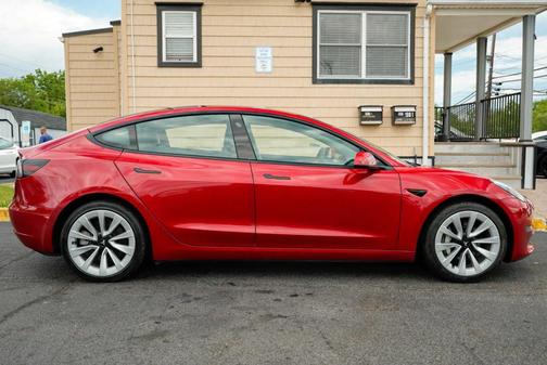Red 2023 Tesla Model 3 Standard Range