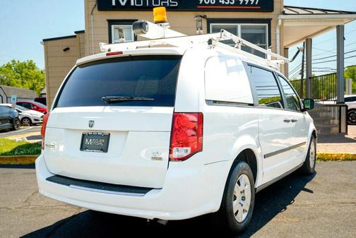 White 2013 RAM Cargo Tradesman