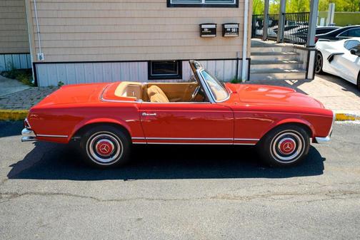 Red 1966 Mercedes-Benz 230SL PAGODA